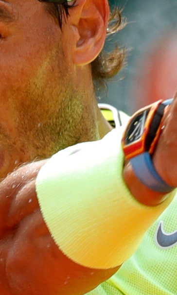 Federer can't handle wind or Nadal in 3-set French Open loss